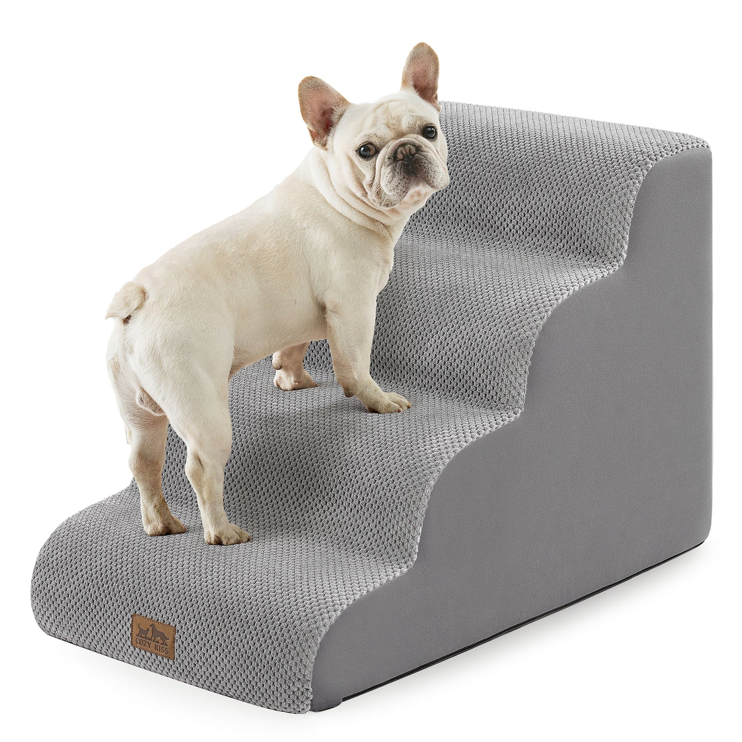 Small dog standing on Cozy Kiss 4-Step Extra Wide Curved Pet Stairs in Grey #color_Grey