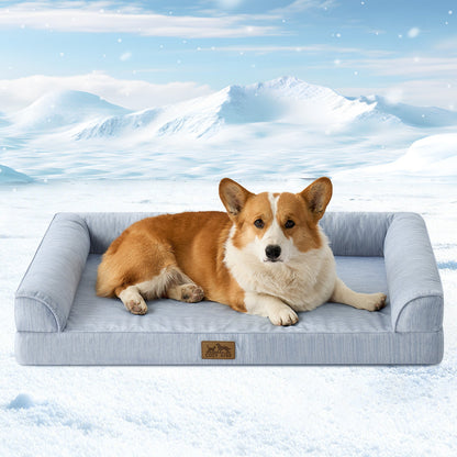 Dog lying on Cozy Kiss sky blue pet bed in a snowy landscape#color_Sky Blue