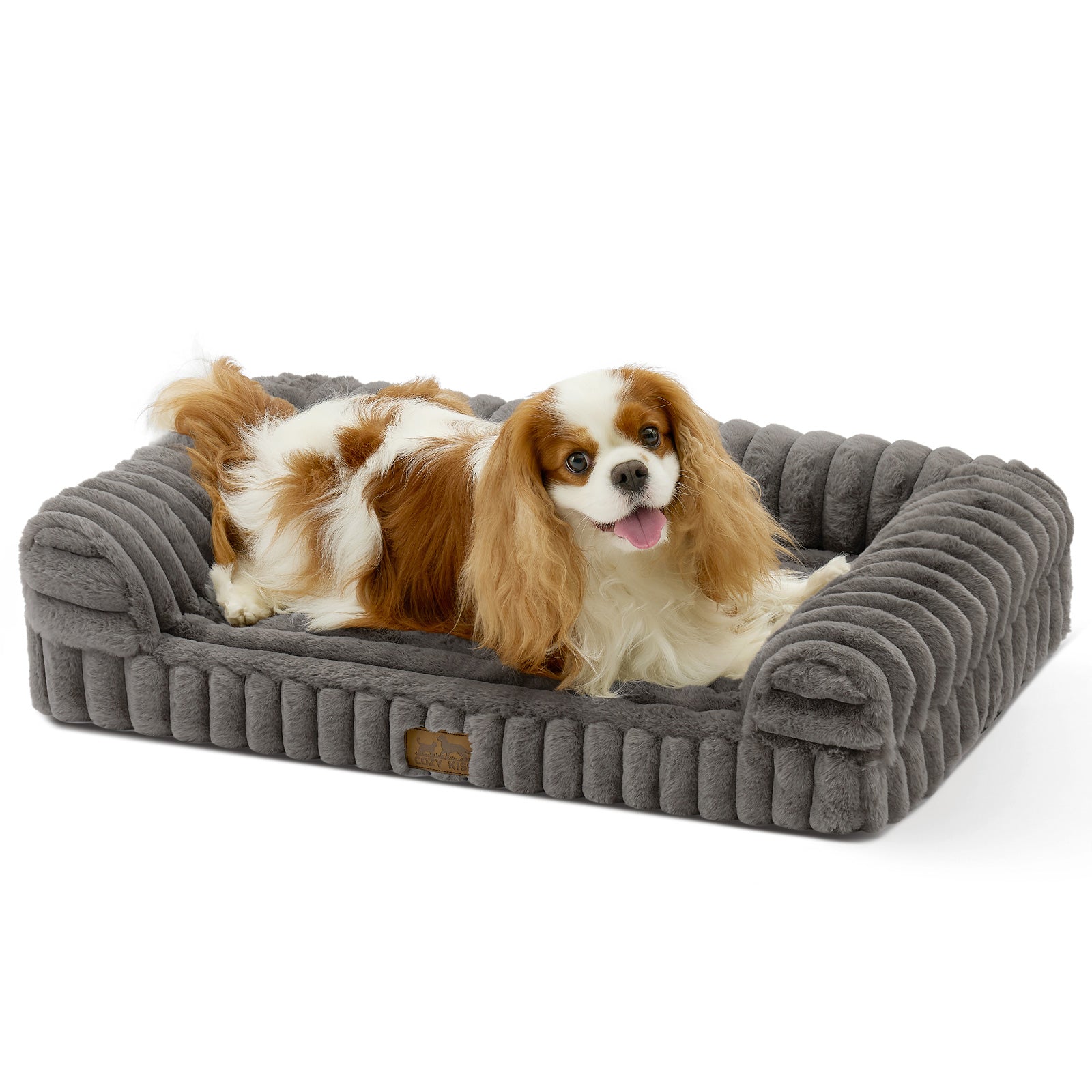 Dog lying on Cozy Kiss Striped Faux U-Shaped Washable Dog Bed, showing raised bolsters and soft striped texture. #color_Grey