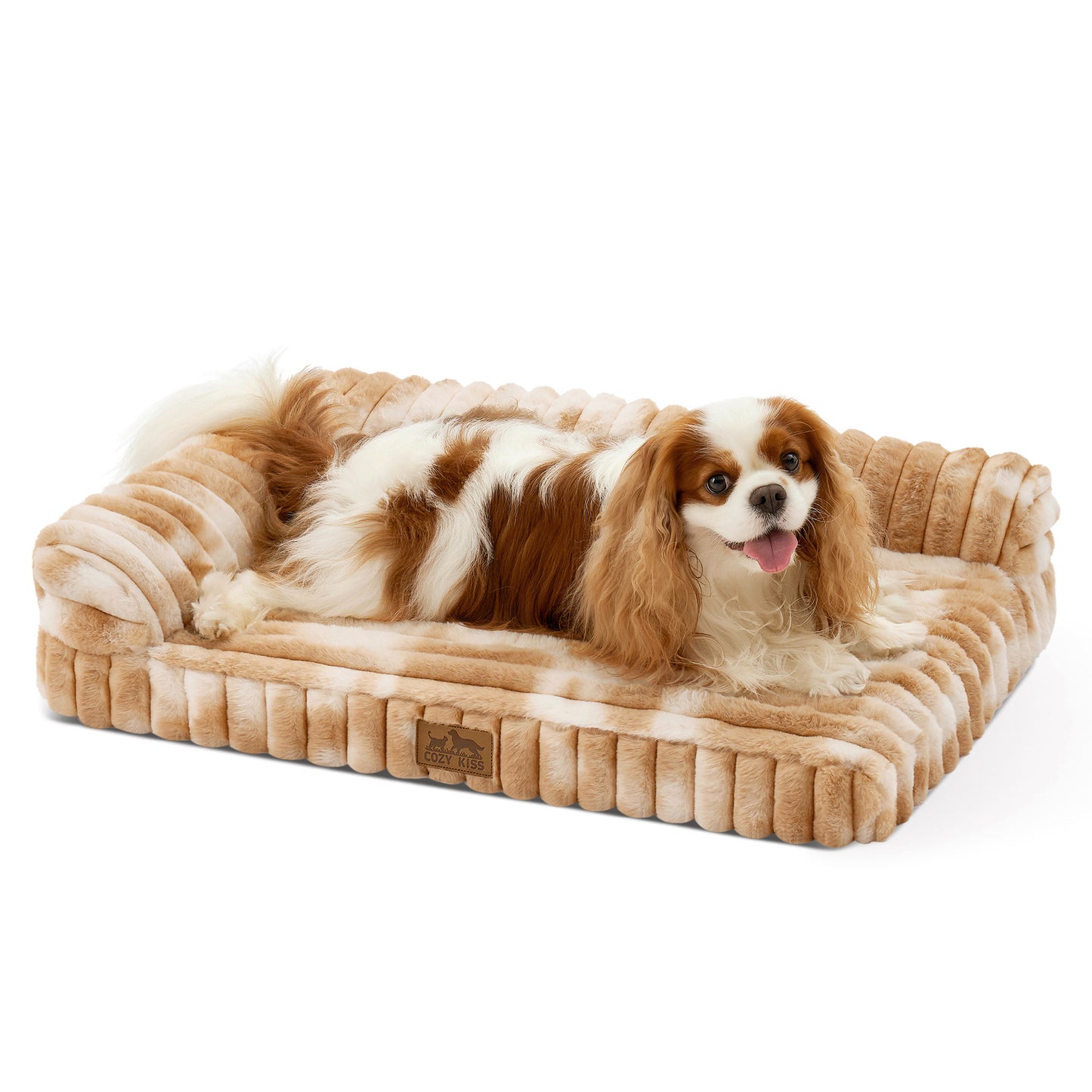 Front view of a dog resting on the Cozy Kiss Striped Faux L-Shaped Washable Dog Bed, showing the raised bolster design. #color_Tie-dye Brown