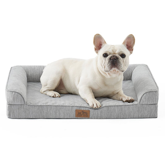 Dog lying on Cozy Kiss grey pet bed with a white background#color_Grey