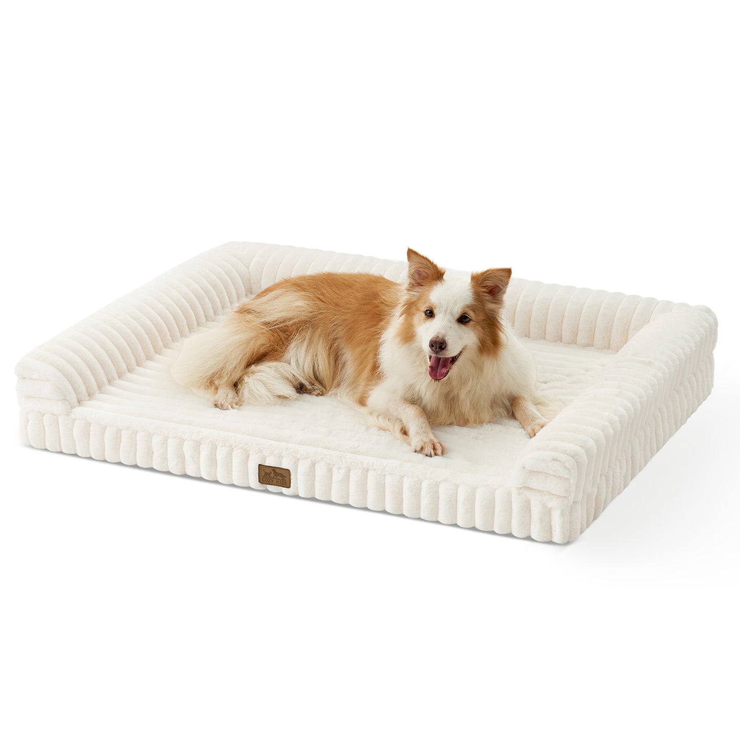 Dog lying on Cozy Kiss Striped Faux U-Shaped Washable Dog Bed, showing raised bolsters and soft striped texture. #color_Cream