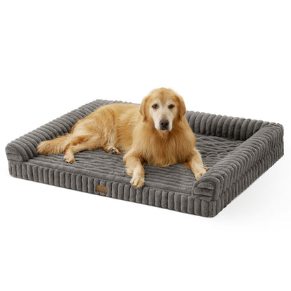 Dog lying on Cozy Kiss Striped Faux U-Shaped Washable Dog Bed, showing raised bolsters and soft striped texture. #color_Grey
