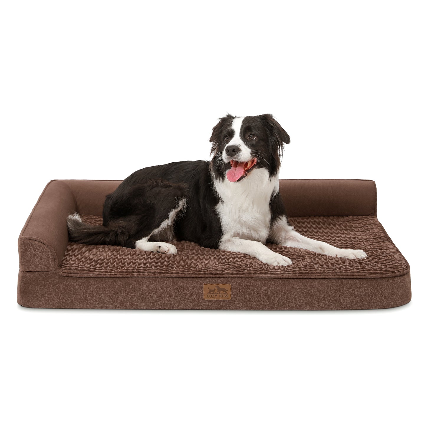 Cozy Kiss All Seasons L-shaped scratch-resistant dog bed in grey, front view with a dog resting on it#color_Brown