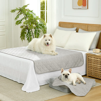 Cozy Kiss Diamond-Quilted Leakproof Cooling Couch Cover on bed with a dog sitting on it #color_Grey