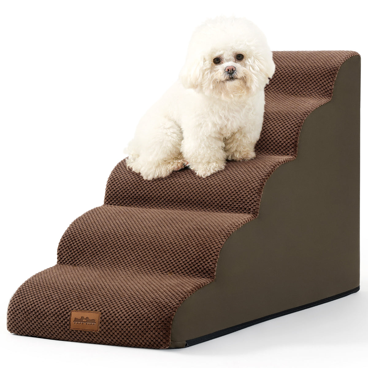 Cozy Kiss 5-Step Joint-Friendly Curved Pet Stairs with washable cover beside armchair helping small dog safely climb down 