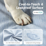 Dog paw on a textured surface with text about cool-to-touch and leakproof design.