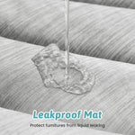 Cozy Kiss leakproof mat preventing liquid from reaching a sofa 