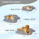 Pet mats of different sizes with dogs for scale.