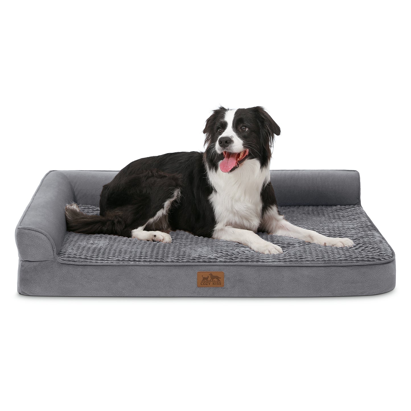 Cozy Kiss All Seasons L-shaped scratch-resistant dog bed in grey, front view with a dog resting on it#color_Grey