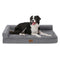 Cozy Kiss All Seasons L-shaped scratch-resistant dog bed in grey, front view with a dog resting on it#color_Grey