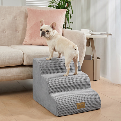 Cozy Kiss 3-Step Gentle Slope Curved Pet Stairs beside a sofa with a dog demonstrating easy and comfortable climbing access #color_Gray